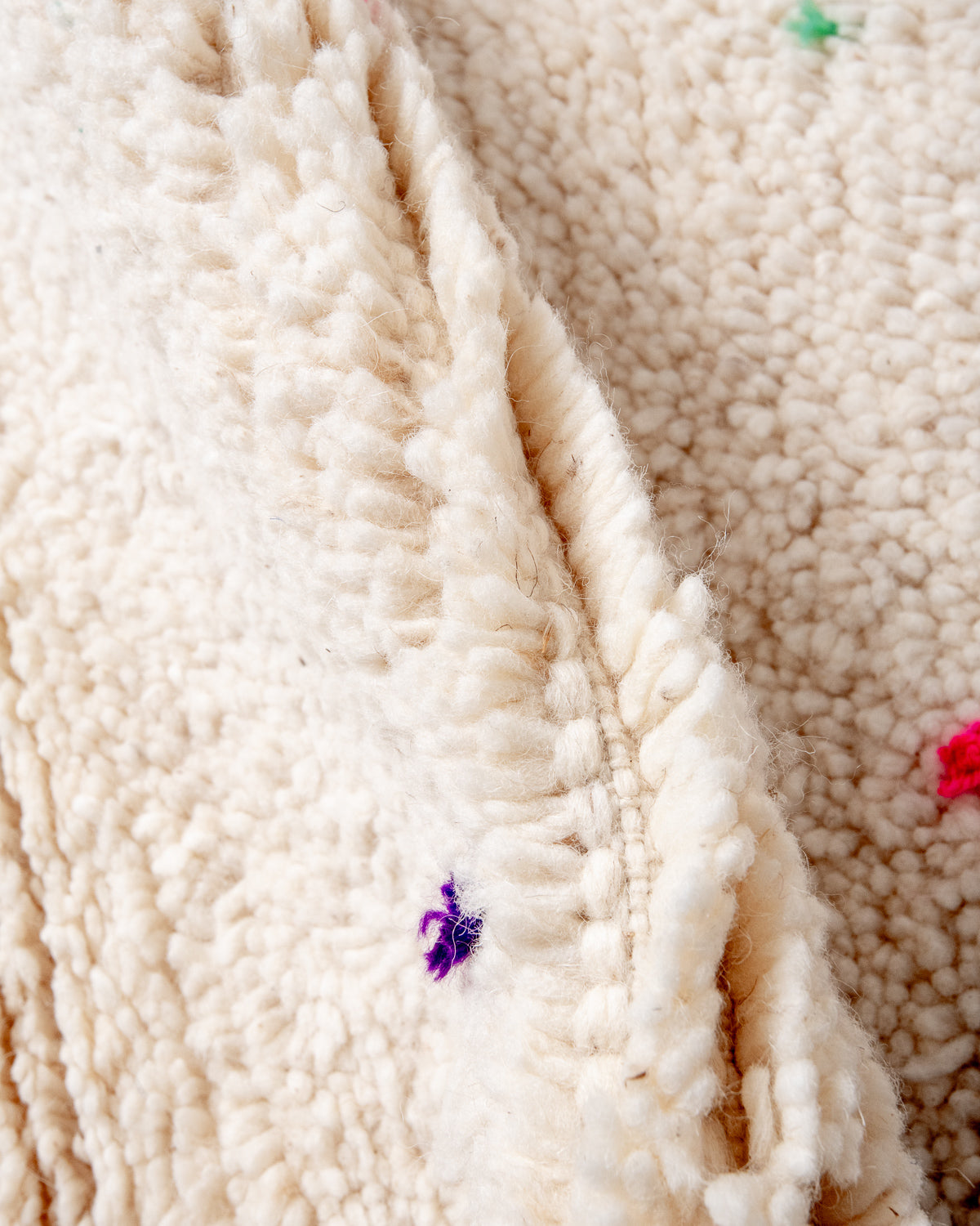 Modern, designer, handcrafted Berber rug from Morocco. Beniourain carpet with beautiful colours and patterns and fluffy wool texture.